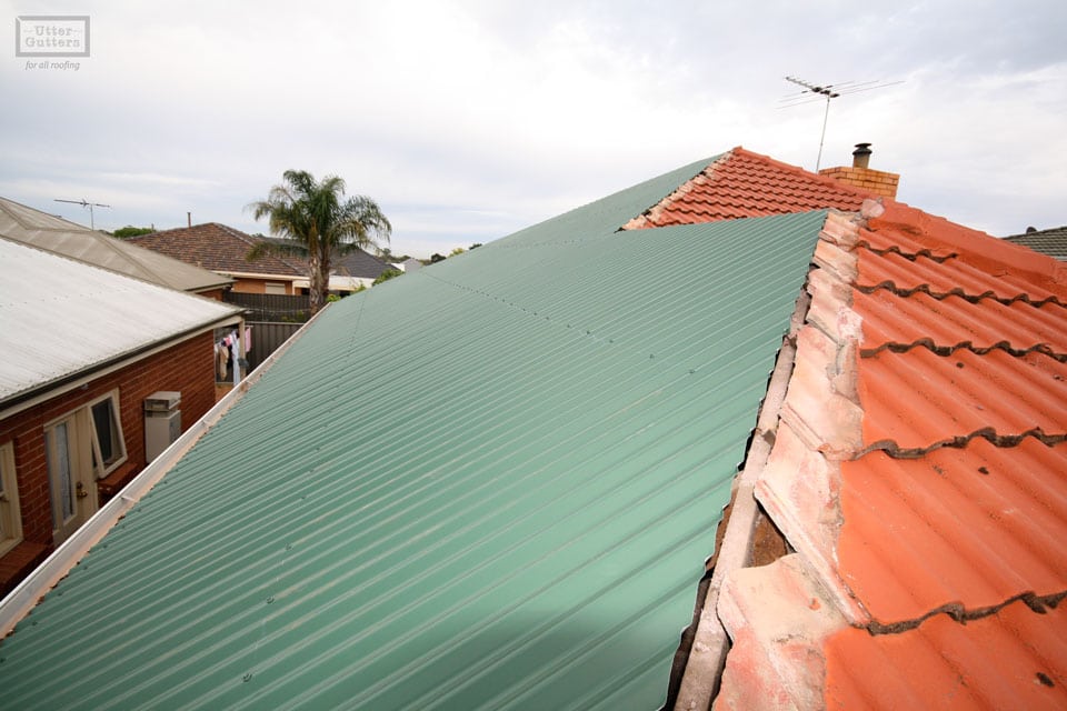 Tile to metal roof conversion